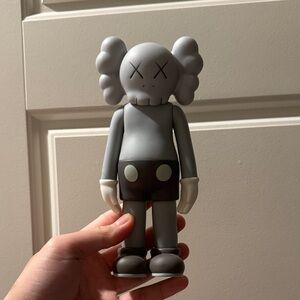 KAWS Gray and White Action Figure